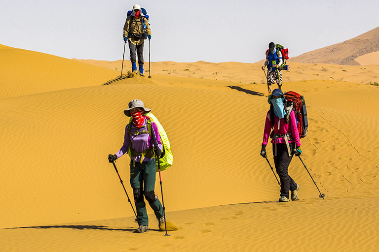 Brave hikers in Badain Jaran Desert