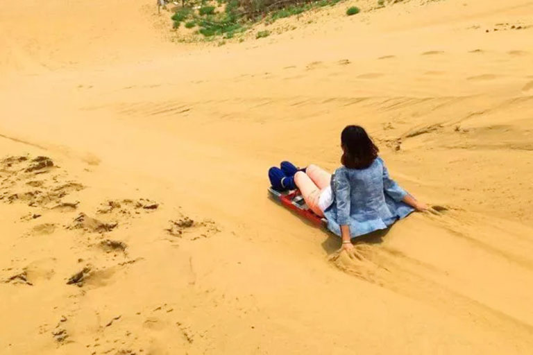 Slide Down on a Steep Sand Hill Things to Do in Badain Jaran Desert
