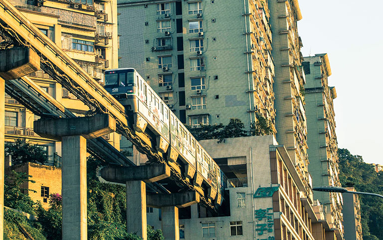 Chongqing Light Rail Going Through a Building at Liziba Metro Station