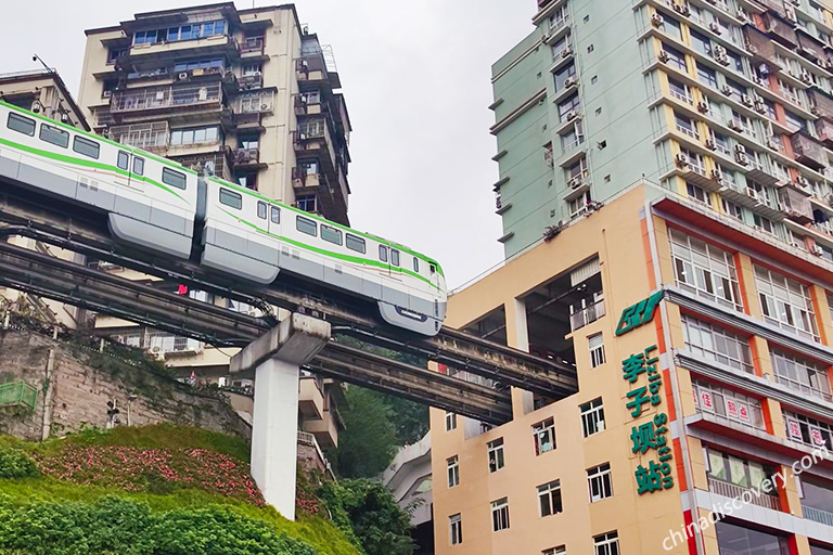 Chongqing Light Rail Going Through a Building at Liziba Metro Station