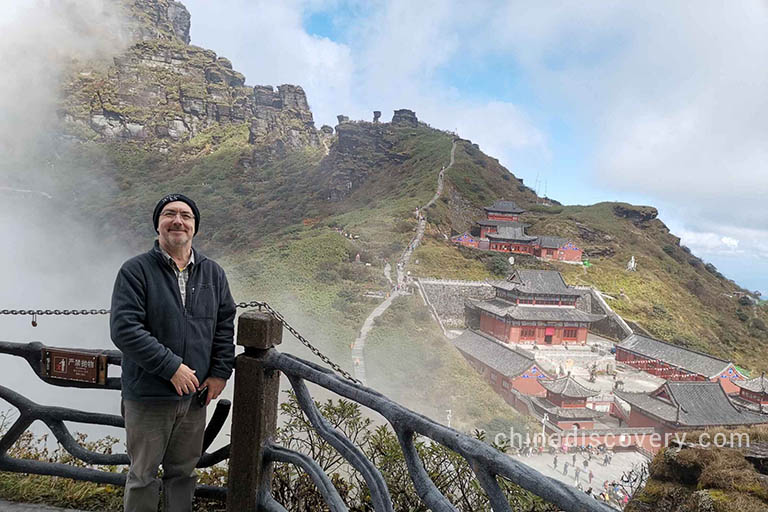 Mark’s group visited Fanjingshan in Guizhou and took a photo with the Cheng'en Temple and Mushroom Stones there