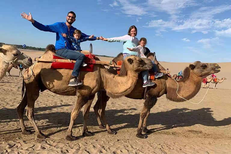 Our customers Lili's family from German visited Singing Sands Mountain in Dunhuang, Gansu in July, 2021. How to Plan a Silk Road Travel - Silk Road Trip Planner