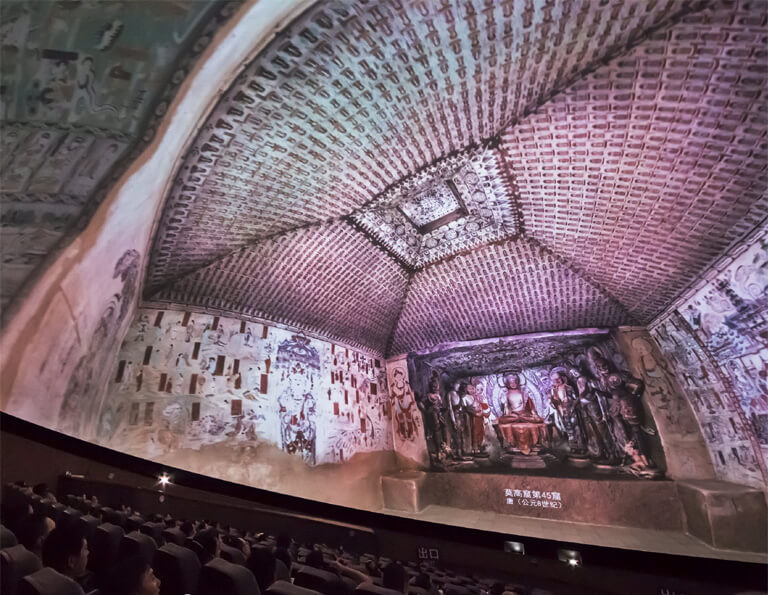Watch a documentary film in the Dome Theater of Mogao Grottoes Digital Exhibition Center