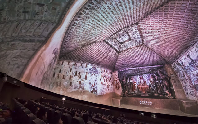 Watch a documentary film in the Dome Theater of Mogao Grottoes Digital Exhibition Center