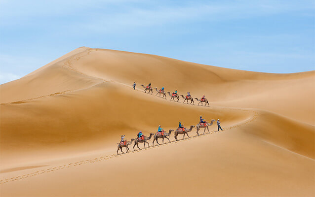 Riding Camel at Mingshashan (Echoing Sand Mountains)