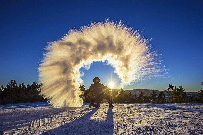 Pouring Hot Water into Ice at China Snow Town