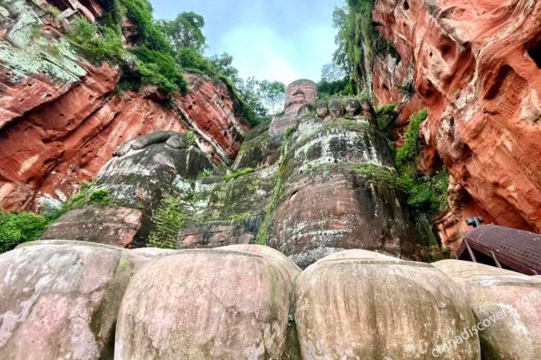 Look up at Leshan Giant Buddha from its foot stage