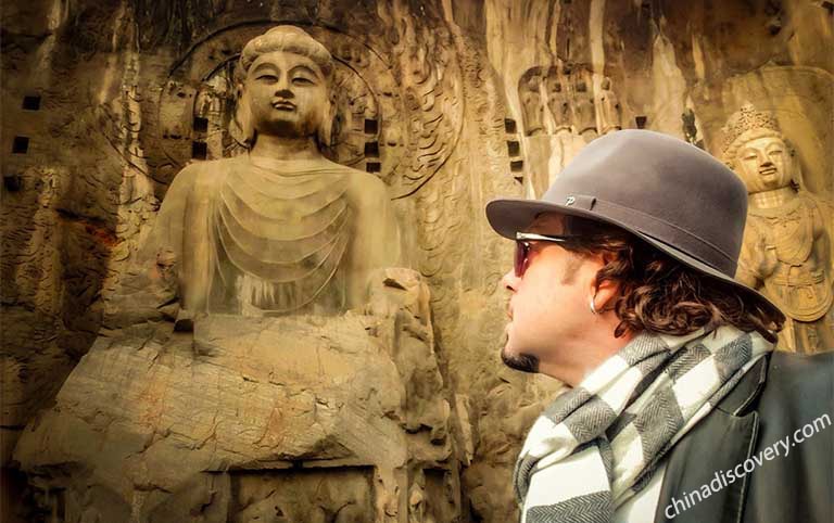Our customer from Italy visit Longmen Grottoes