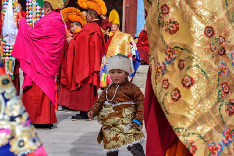 A lovely Tibetan kid during Shaman Festival in Tongren