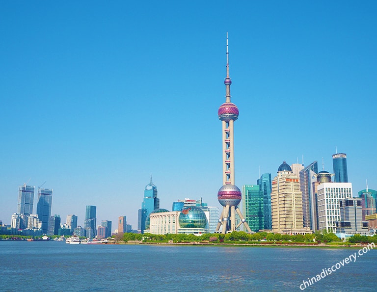 The Oriental Pearl Tower stands proudly among the modern skyscrapers of Shanghai
