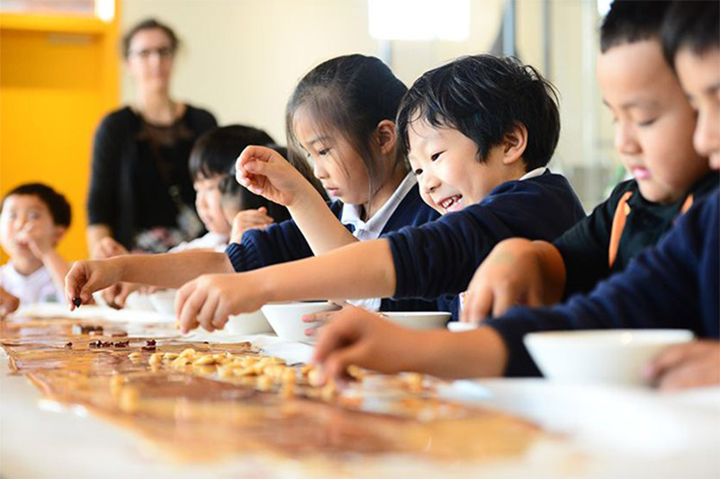 Children Learning Making Chocolate at Zotter Chocolate Factory Shanghai Family Friendly Activities