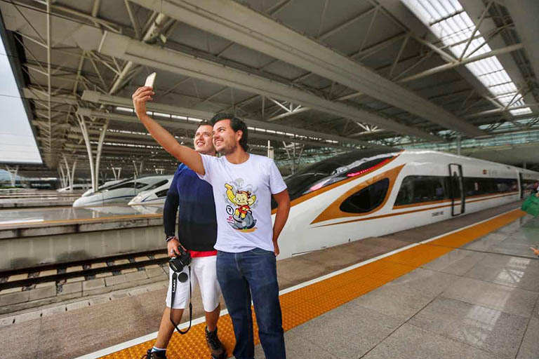 Foreigners were Taking Photo with New Beijing Shanghai High Speed Train Beijing Shanghai High Speed Train