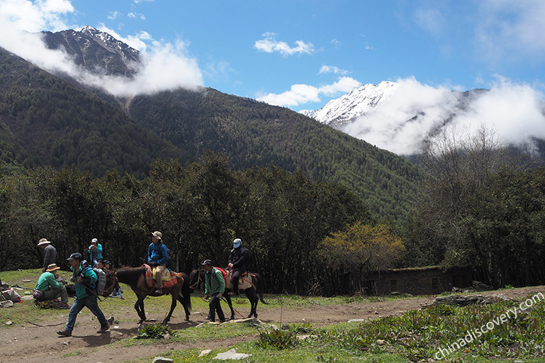 Ride a Horse to Visit Haizi Valley Haizi Valley of Mount Siguniang