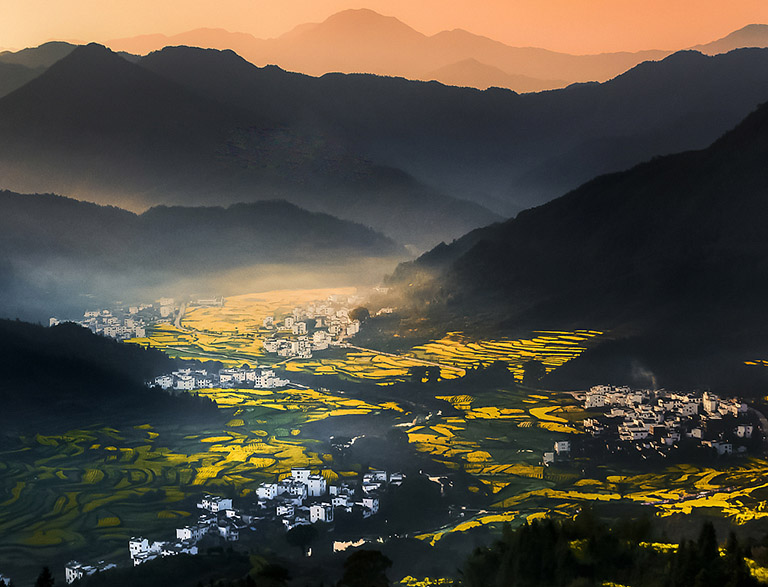 Wuyuan villages in the morning mist China in March
