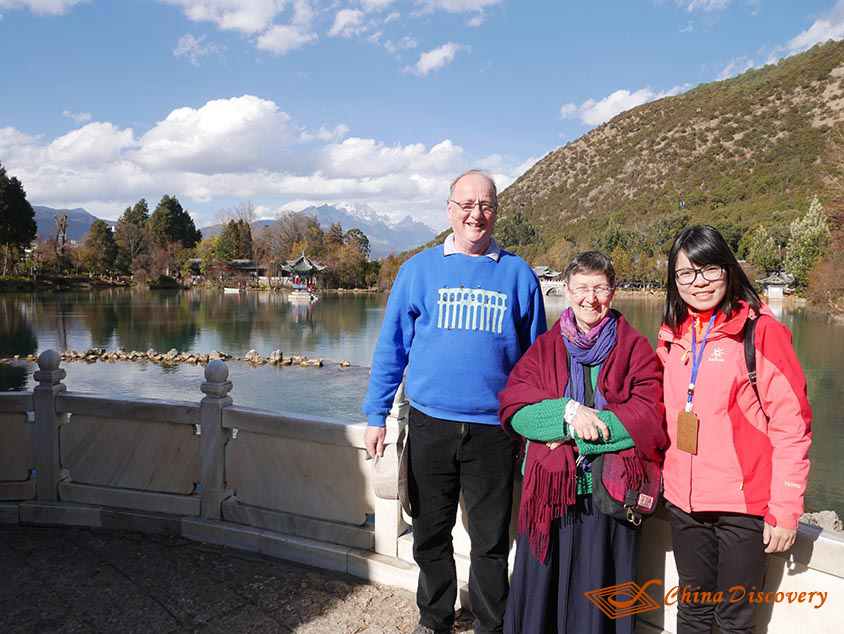 David and His Wife Took a Picture with the Guide at Black Dragon Pool Park in Lijiang, Photo Shared by David, Tour Customized by Wendy