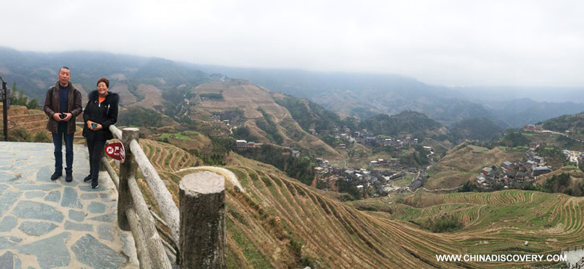 Taking Picture for My Parents Above the Terraces Guilin Trip Blog