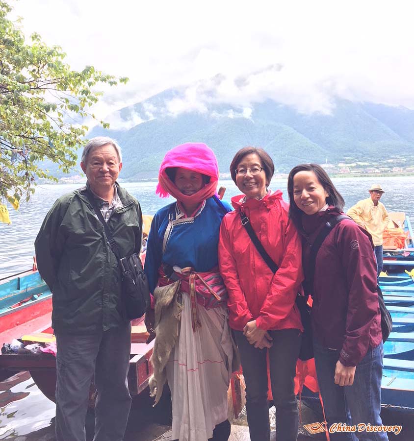 Mr. Maa and His Family at Lugu Lake with A Local Naxi Woman, Tour Customized by Vivien