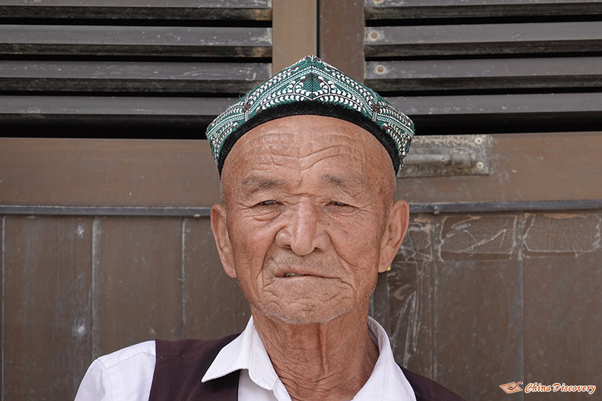 An Aged Uighur Man in Traditional Uighur Costume, Photo Shared by Marcin, Tour Customized by Lily