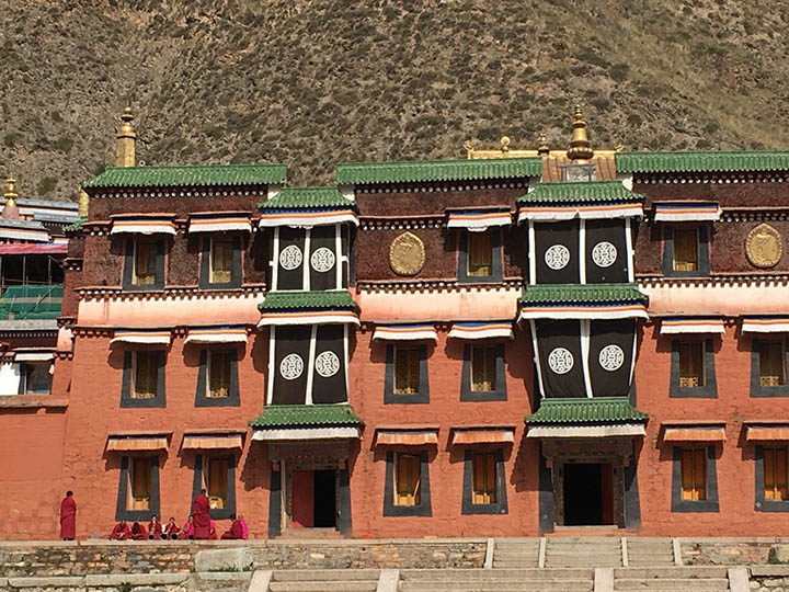 Monks Sit in Front of Labrang Monastery, Photo Shared by Monica, Tour Customized by Leo