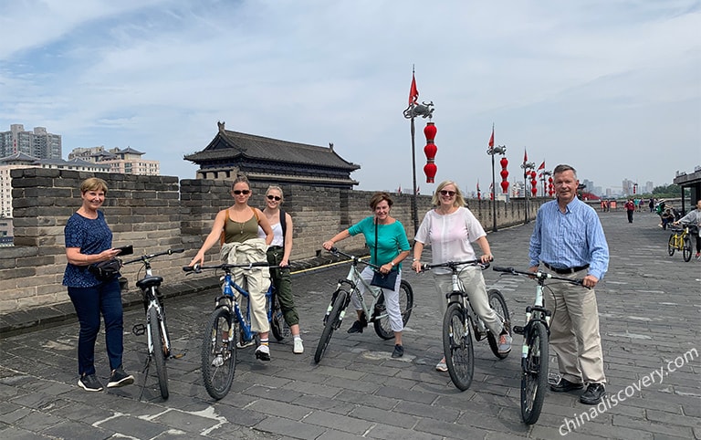 Visitor Riding on Ancient City Wall